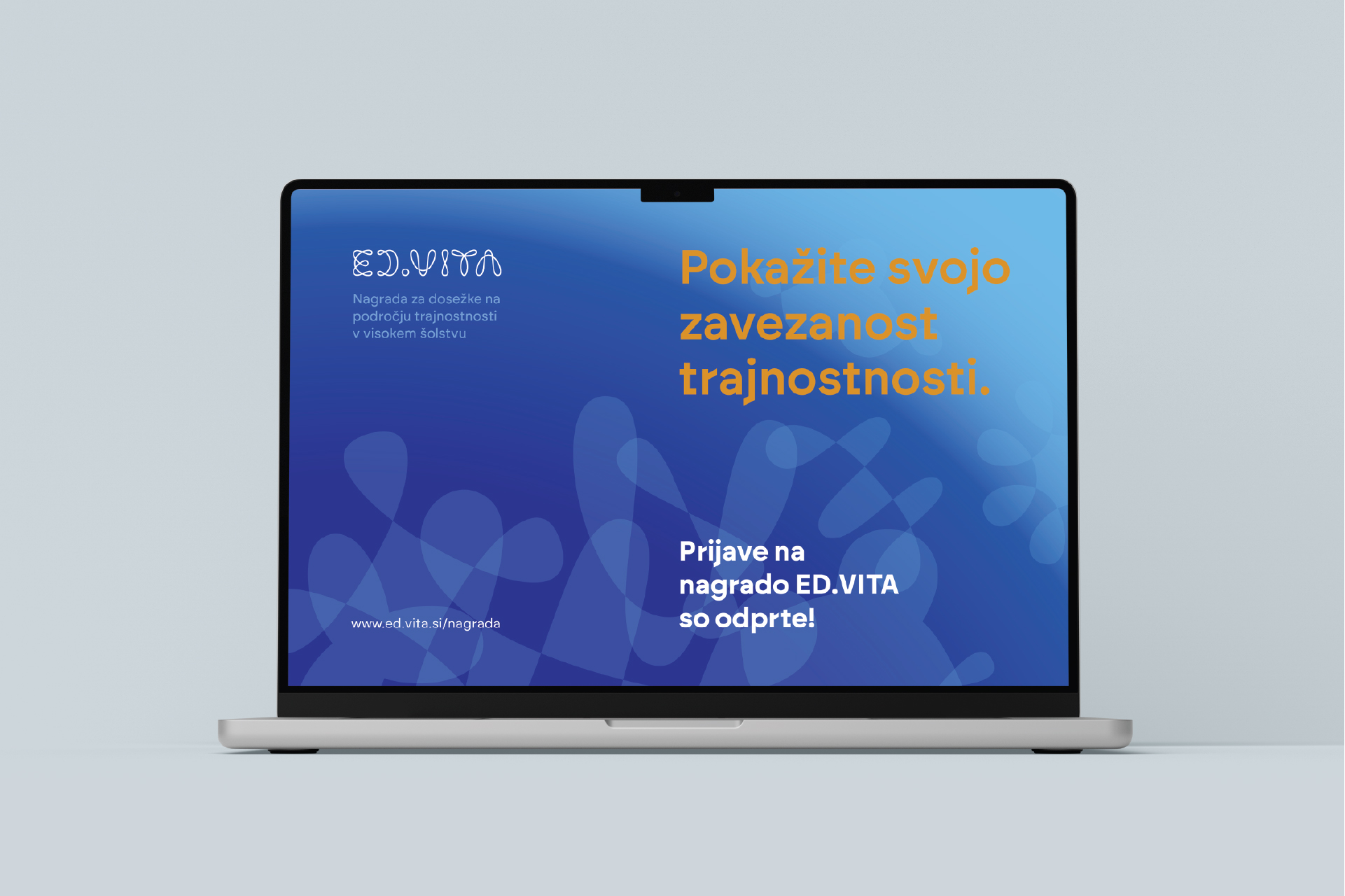 Laptop showing ED.VITA website design with minimalist line logo and eco-themed graphics, reflecting sustainable design and design award identity.